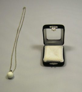 Аромакулон Фантазия, камень - мраморный оникс, на цепочке, в подарочной упаковке 6,5х5,5 см