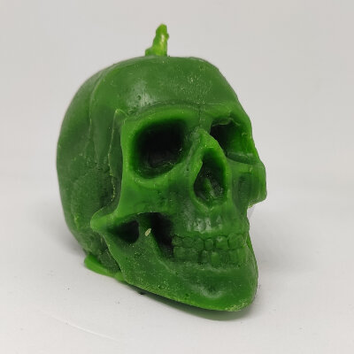 Свеча восковая череп зеленая малая %% внешний вид
