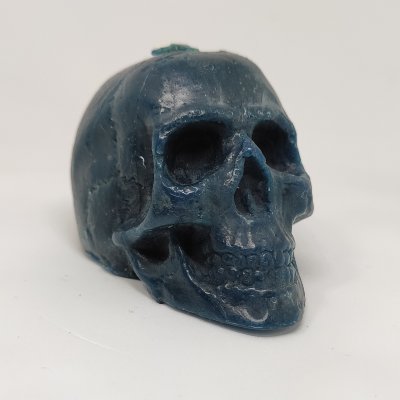 Свеча восковая череп синяя малая %% внешний вид